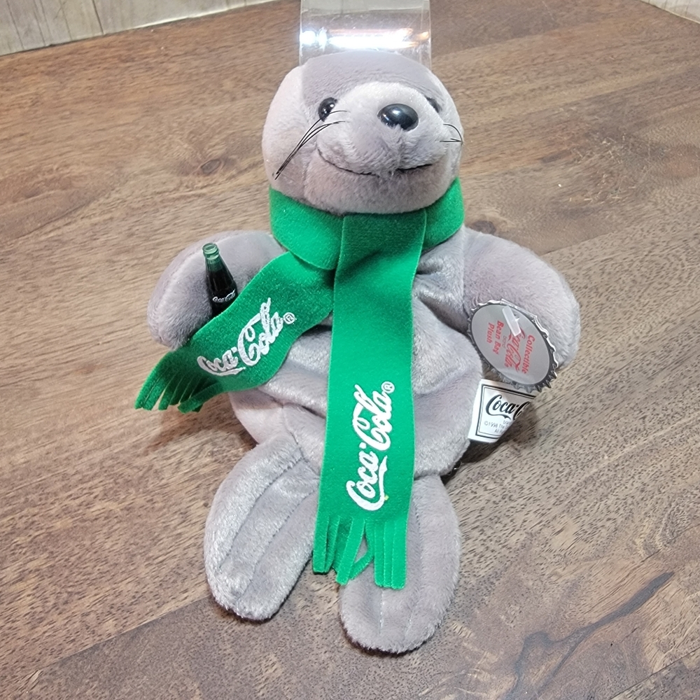 New with tags, Coke-cola seal.